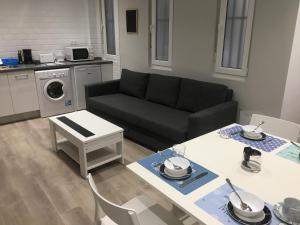 A kitchen or kitchenette at APARTAMENTOS GyC VIVIENDAS GOLD