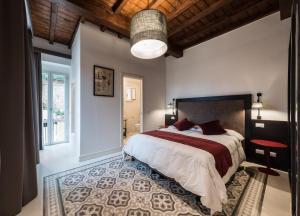 Łóżko lub łóżka w pokoju w obiekcie Dolcevita Apartments