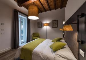 Łóżko lub łóżka w pokoju w obiekcie Dolcevita Apartments