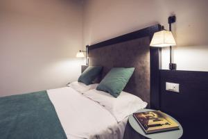 Łóżko lub łóżka w pokoju w obiekcie Dolcevita Apartments