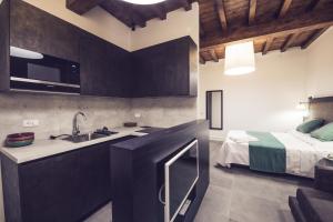 Kuchnia lub aneks kuchenny w obiekcie Dolcevita Apartments