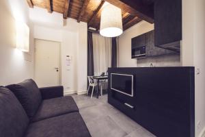 Telewizja i/lub zestaw kina domowego w obiekcie Dolcevita Apartments