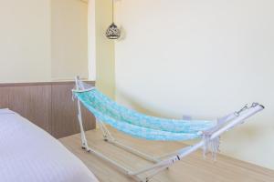 Voodi või voodid majutusasutuse Water Reflection水映民宿 l 電梯 toas