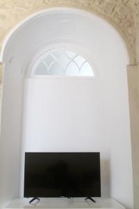 Μια τηλεόραση ή/και κέντρο ψυχαγωγίας στο Casa Atahona - Casita con Encanto