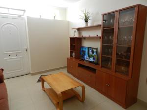 TV a/nebo společenská místnost v ubytování Trotamundos GC FAMILIAS Y ADULTOS RESPONSABLES