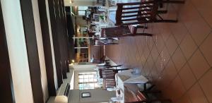 A restaurant or other place to eat at Pietersburg Club