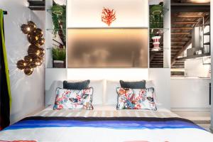 Postelja oz. postelje v sobi nastanitve Pgrhome Luxury Apartments Coral Loft Venice