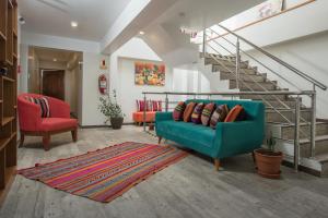 Uma área de estar em Casa Matara Boutique