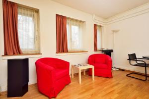 Svetainės erdvė apgyvendinimo įstaigoje Garden Studio Apartment Zürichberg