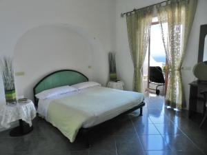 Postel nebo postele na pokoji v ubytování Hotel Holiday
