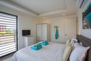Letto o letti in una camera di La Royal Penthouse Apartment Jan Thiel