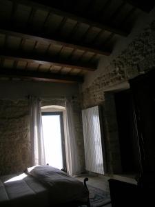 Postel nebo postele na pokoji v ubytování Masseria del Ponte