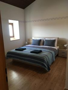 Postel nebo postele na pokoji v ubytování Villa Macini