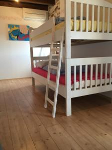 Postel nebo postele na pokoji v ubytování Villa Macini