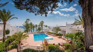 a view of the pool at the resort at Macdonald Leila Playa Resort in La Cala de Mijas