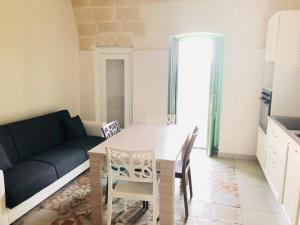 A kitchen or kitchenette at Le Tre Meraviglie