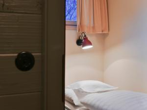 Postel nebo postele na pokoji v ubytování Gasthof Rössle