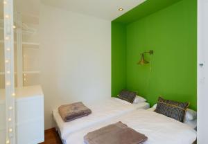 Postel nebo postele na pokoji v ubytování Hideaway Villa am Meer