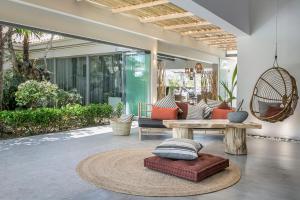 a living room with a couch and a table at Avithos Resort Hotel in Svoronata