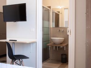 Ванная комната в Lobby Collective Hostel - Lecce