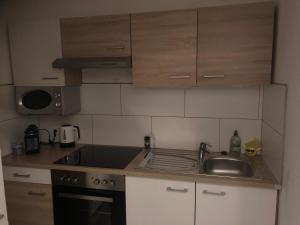 Kuchnia lub aneks kuchenny w obiekcie City Apartments Klinikum