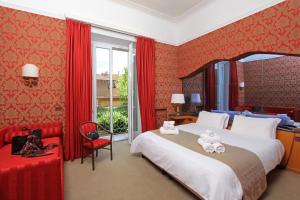 Postel nebo postele na pokoji v ubytování Hotel Arcangelo