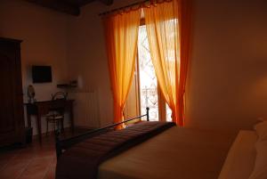 Posteľ alebo postele v izbe v ubytovaní B&B Beata Solitudo