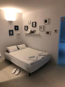 
A bed or beds in a room at Apartments Bastinica

