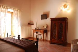 Posteľ alebo postele v izbe v ubytovaní B&B Beata Solitudo