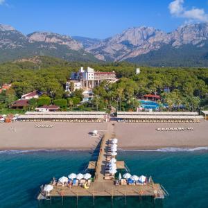 a row of boats sitting on top of a beach at Seven Seas Hotel Life - Ultra All Inclusive & Kids Concept in Kemer