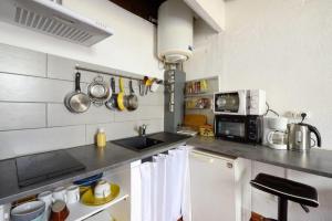 Η κουζίνα ή μικρή κουζίνα στο Appartement le Platane
