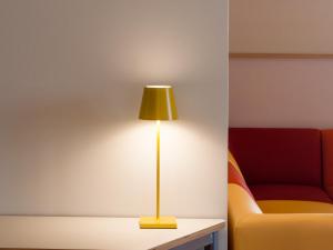 A seating area at Lobby Collective Hostel - Lecce