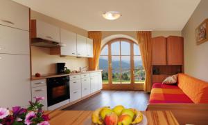 A kitchen or kitchenette at Steierhof