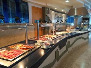a buffet line with many different types of food at Paradise Bay Resort in Mellieħa