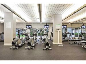 a gym with a lot of cardio equipment in it at Miami Hollywood Bay View on the Beach 002-1bvic in Hollywood