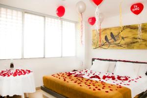Uma cama ou camas num quarto em Hotel Onix T