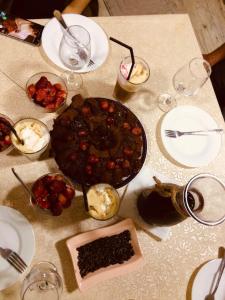 a table with plates of food on a table at wine valley in Udabno