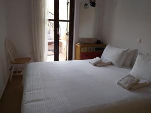 Rúm í herbergi á Elezar