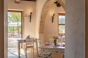 En restaurant eller et andet spisested på GH Borgo Pulciano Agriturismo