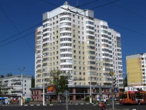 a large white building on a city street at PaulMarie Apartments on Prs. Stroiteley in Vitebsk