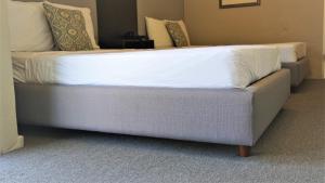 Кровать или кровати в номере Villa Verde Inn