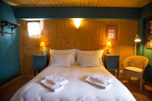 Cama o camas de una habitación en Plein Ciel - Hôtel d'altitude à 1800m