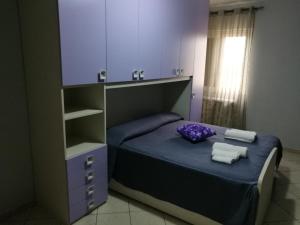 Posteľ alebo postele v izbe v ubytovaní Casa in Centro via gioeni