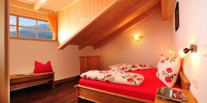 A bed or beds in a room at Steierhof