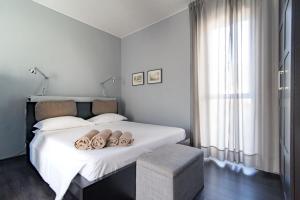 Posteľ alebo postele v izbe v ubytovaní Via Mentana 32 - The House Of Travelers