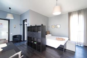 Posteľ alebo postele v izbe v ubytovaní Via Mentana 32 - The House Of Travelers