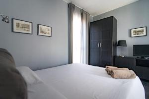 Posteľ alebo postele v izbe v ubytovaní Via Mentana 32 - The House Of Travelers