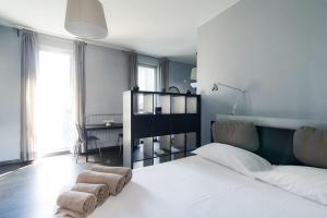 Posteľ alebo postele v izbe v ubytovaní Via Mentana 32 - The House Of Travelers