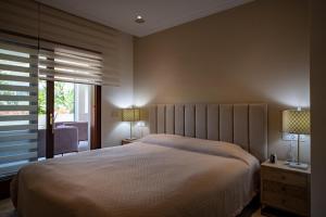 Posteľ alebo postele v izbe v ubytovaní Luxury apartment at Lomas del Rey, Puente Romano