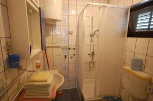 Koupelna v ubytování Apartments Juric by El-Pi Tours + 22 fotografií
